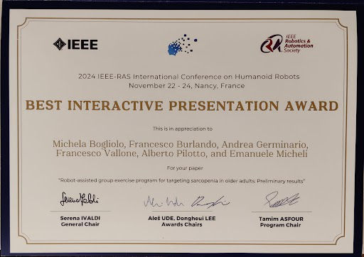 Premio della IEEE-RAS alla presentazione del progetto RO.SA con robot umanoidi